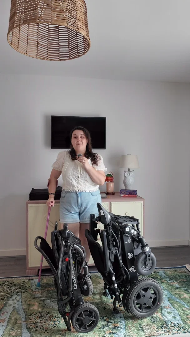 Episode 2 of 'The Wheel Deal': Let's talk Q50 storage.
I get loads of questions about these chairs, let me know if you have any more in the comments!VD: A white woman, wearing a white top and jean shorts. She is standing next to two folding wheelchairs, one which is much larger in structure than the other.